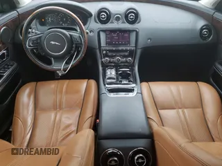2017 Jaguar XJ with VIN SAJWA1C73H8W10544, listed as a Copart auction lot 70025724 with 64,437 mi miles and Salvage Title. Bid and sale history available at carsss.com. Image 8.