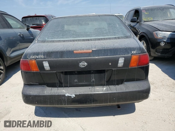 1997 Nissan Sentra XE z VIN 3N1AB41D3VL035555, wystawiony jako Copart lot #76200984 z przebiegiem 166 012 mil mil oraz Szkoda całkowita • Salvage title. Historia ofert i sprzedaży dostępna na DreamBid. Obrazek 6.