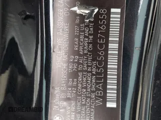 2012 BMW Z4 sDrive28i with VIN WBALL5C56CE716558, listed as a Copart auction lot 62003125 with 93,438 mi miles and Salvage title. Bid and sale history available at DreamBid. Image 12.