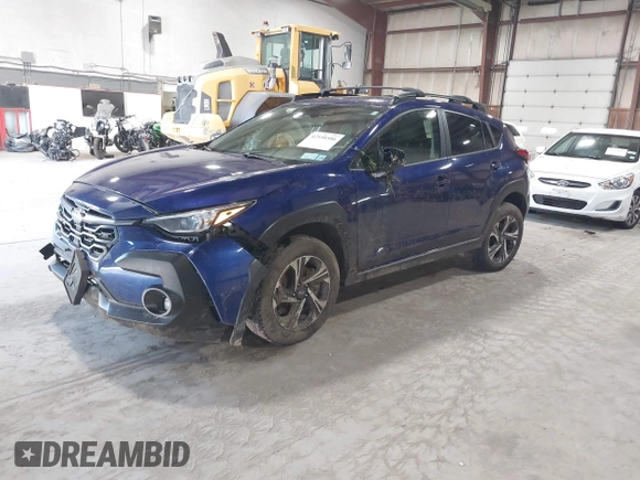 2024 Subaru Crosstrek Premium z VIN JF2GUADC3R8318644, wystawiony jako IAAI lot #42558586 z przebiegiem 33 648 mil mil oraz . Historia ofert i sprzedaży dostępna na DreamBid. Obrazek 2.