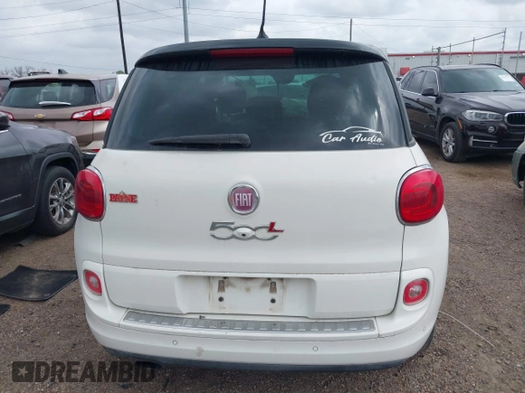 2014 FIAT 500L Lounge z VIN ZFBCFACH4EZ029431, wystawiony jako IAAI lot #42110055 z przebiegiem 103 789 mil mil oraz . Historia ofert i sprzedaży dostępna na DreamBid. Obrazek 16.
