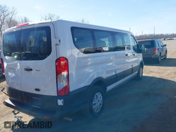 2021 Ford Transit Passenger XL with VIN 1FBAX2Y83MKA49312, listed as a IAAI auction lot 41806818 with 71,286 mi miles. Bid and sale history available at carsss.com. Image 4.
