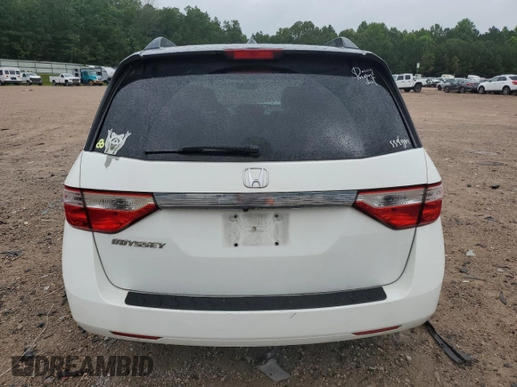 2013 Honda Odyssey EX-L with VIN 5FNRL5H62DB048370, listed as a Copart auction lot 63013465 with 129,552 mi miles and Salvage title. Bid and sale history available at DreamBid. Image 6.