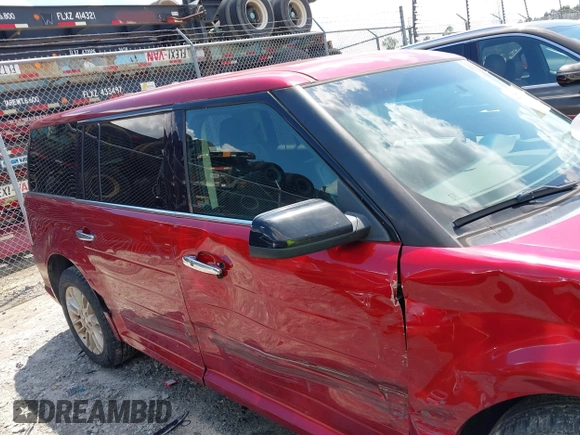 2016 Ford Flex SEL z VIN 2FMGK5C87GBA19902, wystawiony jako IAAI lot #42270902 z przebiegiem 111 862 mil mil oraz . Historia ofert i sprzedaży dostępna na DreamBid. Obrazek 13.