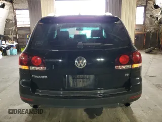 2010 Volkswagen Touareg VR6 with VIN WVGBF7A99AD002591, listed as a Copart auction lot 70624234 with 154,330 mi miles and Salvage Title. Bid and sale history available at DreamBid. Image 6.