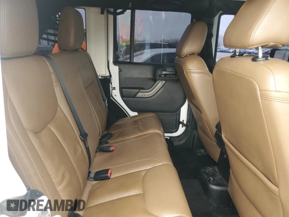2013 Jeep Wrangler Unlimited Moab with VIN 1C4BJWEG6DL583841, listed as a Copart auction lot 52487915 with 130,369 mi miles and Salvage title. Bid and sale history available at DreamBid. Image 11.