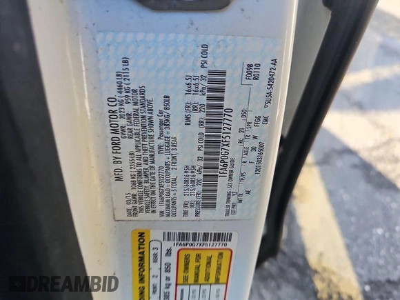 2015 Ford Fusion S with VIN 1FA6P0G7XF5127770, listed as a IAAI auction lot 42845978 with 150,942 mi miles and . Bid and sale history available at DreamBid. Image 2.