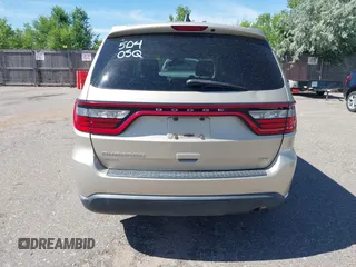2014 Dodge Durango SXT with VIN 1C4RDJAG0EC455787, listed as a IAAI auction lot 42651627 with 103,218 mi miles and . Bid and sale history available at DreamBid. Image 16.