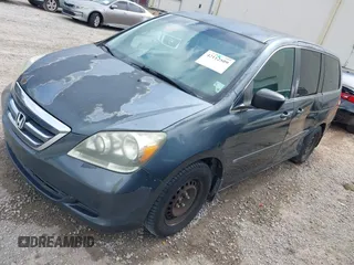 2006 Honda Odyssey LX z VIN 5FNRL38296B099742, wystawiony jako IAAI lot #42112509 z przebiegiem 328 220 mil mil oraz . Historia ofert i sprzedaży dostępna na DreamBid. Obrazek 2.