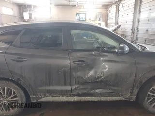 2019 Hyundai Tucson Ultimate with VIN KM8J3CAL0KU063161, listed as a IAAI auction lot 41606894 with 56,037 mi miles. Bid and sale history available at carsss.com. Image 6.