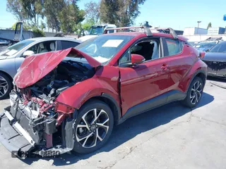 2019 Toyota C-HR XLE with VIN JTNKHMBX1K1060316, listed as a IAAI auction lot 41764464 with 42,956 mi miles. Bid and sale history available at carsss.com. Image 2.