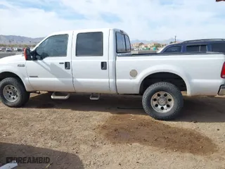 2004 Ford Super Duty F-250 XL with VIN 1FTNW21P54EC54548, listed as a IAAI auction lot 41722979 with 214,043 mi miles. Bid and sale history available at carsss.com. Image 14.