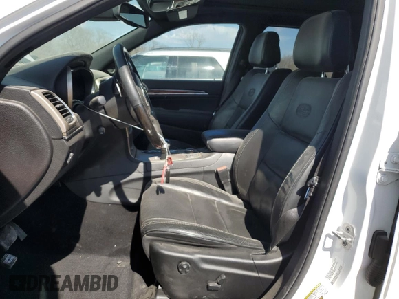 2014 Jeep Grand Cherokee Overland with VIN 1C4RJFCT7EC105296, listed as a Copart auction lot 50822775 with 180,067 mi miles and Salvage Title. Bid and sale history available at DreamBid. Image 7.