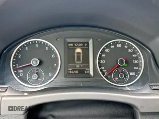 2011 Volkswagen Tiguan SEL with VIN WVGAV7AX1BW000384, listed as a Copart auction lot 59420805 with 166,245 mi miles and Clean title. Bid and sale history available at DreamBid. Image 8.
