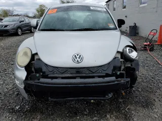 2000 Volkswagen Beetle GLX with VIN 3VWDD21C0YM482825, listed as a Copart auction lot 53031135 with 153,167 mi miles and Salvage Title. Bid and sale history available at DreamBid. Image 5.