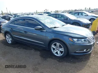 2014 Volkswagen CC Sport with VIN WVWBP7AN7EE530659, listed as a IAAI auction lot 42260096 with 105,521 mi miles and . Bid and sale history available at DreamBid. Image 1.