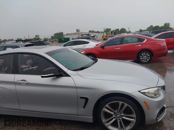 2015 BMW 4 Series 428i with VIN WBA4A9C50FD416459, listed as a IAAI auction lot 42471985 with 160,089 mi miles and . Bid and sale history available at DreamBid. Image 13.
