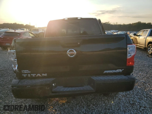 2019 Nissan Titan Pro-4X z VIN 1N6AA1E53KN525603, wystawiony jako Copart lot #77336264 z przebiegiem 64 507 mil mil oraz Szkoda całkowita • Salvage title. Historia ofert i sprzedaży dostępna na DreamBid. Obrazek 6.