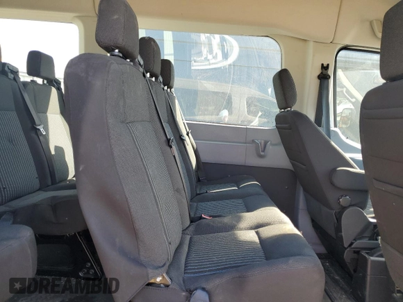 2018 Ford Transit Passenger XL z VIN 1FBZX2CM5JKB30542, wystawiony jako Copart lot #48534655 z przebiegiem 97 952 mil mil oraz Tytuł czysty. Historia ofert i sprzedaży dostępna na DreamBid. Obrazek 11.