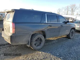 2015 GMC Yukon XL SLT with VIN 1GKS2HKC4FR697416, listed as a Copart auction lot 87887925 with 236,772 mi miles and Salvage Title. Bid and sale history available at carsss.com. Image 3.