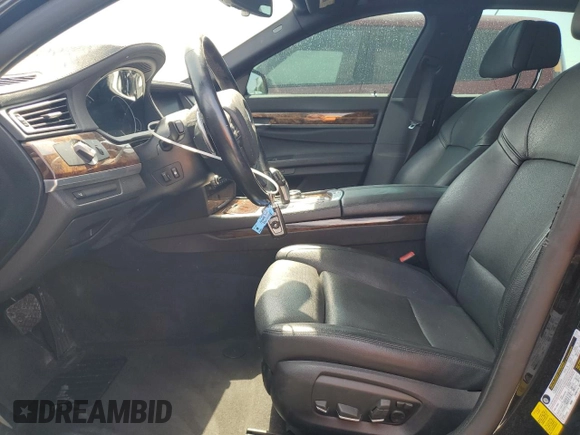 2014 BMW 7 Series 740Li with VIN WBAYE4C52ED138770, listed as a Copart auction lot 53647665 with 106,827 mi miles and Salvage title. Bid and sale history available at DreamBid. Image 7.