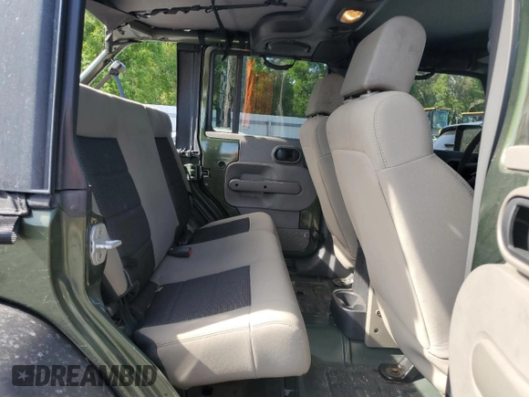 2008 Jeep Wrangler Unlimited X with VIN 1J4GB39108L608465, listed as a Copart auction lot 50949015 with 103,205 mi miles and Salvage Title. Bid and sale history available at DreamBid. Image 10.
