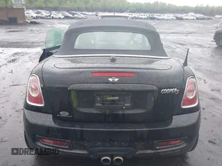 2013 MINI Roadster S z VIN WMWSY3C50DT566042, wystawiony jako IAAI lot #42264418 z przebiegiem 84 762 mil mil oraz . Historia ofert i sprzedaży dostępna na DreamBid. Obrazek 16.