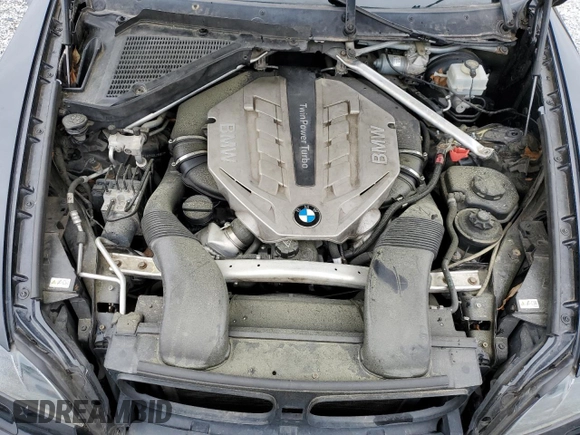 2011 BMW X6 50i z VIN 5UXFG8C50BLZ96931, wystawiony jako Copart lot #54409465 z przebiegiem 154 818 mil mil oraz Szkoda całkowita • Salvage title. Historia ofert i sprzedaży dostępna na DreamBid. Obrazek 12.