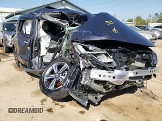 2019 Honda Odyssey Touring z VIN 5FNRL6H89KB079197, wystawiony jako Copart lot #57996861 z przebiegiem Nie podano mil oraz Nie do naprawy • Non repairable. Historia ofert i sprzedaży dostępna na DreamBid. Obrazek 1.