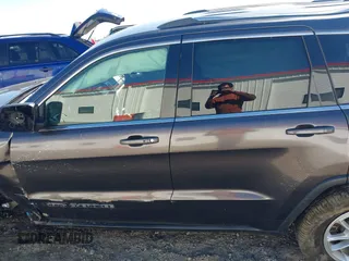 2018 Jeep Grand Cherokee Laredo E with VIN 1C4RJFAG8JC335459, listed as a IAAI auction lot 41850163 with 93,289 mi miles. Bid and sale history available at carsss.com. Image 14.