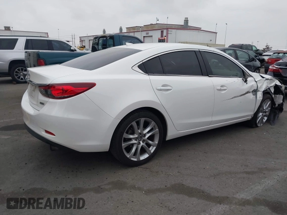 2016 Mazda Mazda6 i Touring with VIN JM1GJ1V52G1468807, listed as a IAAI auction lot 41888686 with 121,764 mi miles. Bid and sale history available at carsss.com. Image 4.