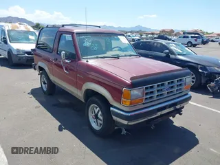 1989 Ford Bronco z VIN 1FMCU14T7KUB48942, wystawiony jako IAAI lot #40053705 z przebiegiem 96 024 mil mil oraz . Historia ofert i sprzedaży dostępna na DreamBid. Obrazek 1.