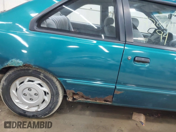 1994 Ford Tempo z VIN 1FAPP31X6RK108511, wystawiony jako IAAI lot #42004445 z przebiegiem 3 310 mil mil oraz . Historia ofert i sprzedaży dostępna na DreamBid. Obrazek 6.