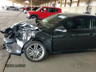 2006 Scion tC z VIN JTKDE177X60065130, wystawiony jako Copart lot #54946675 z przebiegiem 60 926 mil mil oraz Szkoda całkowita • Salvage title. Historia ofert i sprzedaży dostępna na DreamBid. Obrazek 13.