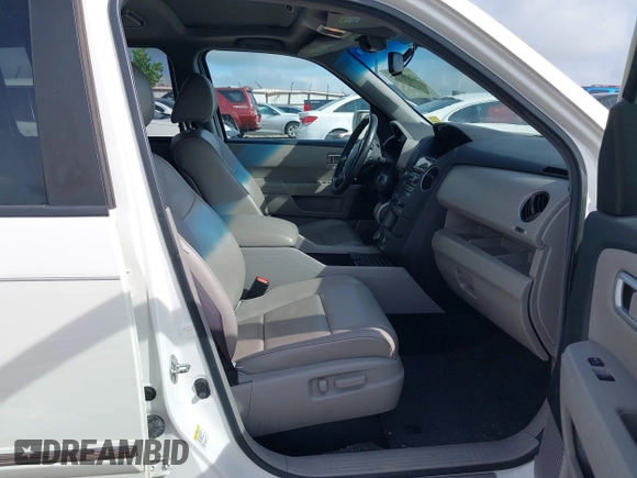 2013 Honda Pilot Touring z VIN 5FNYF4H99DB017351, wystawiony jako IAAI lot #42355167 z przebiegiem 122 191 mil mil oraz . Historia ofert i sprzedaży dostępna na DreamBid. Obrazek 5.