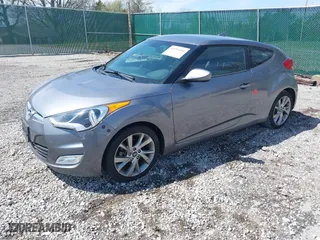 2017 Hyundai Veloster with VIN KMHTC6AD8HU305853, listed as a IAAI auction lot 41915404 with 115,663 mi miles. Bid and sale history available at carsss.com. Image 18.