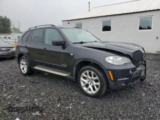 2012 BMW X5 35i with VIN 5UXZV4C57CL765053, listed as a Copart auction lot 59997275 with 157,943 mi miles and Salvage title. Bid and sale history available at DreamBid. Image 4.