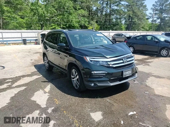 2017 Honda Pilot Touring z VIN 5FNYF6H93HB051982, wystawiony jako Copart lot #53390535 z przebiegiem Nie podano mil oraz Szkoda całkowita • Salvage title. Historia ofert i sprzedaży dostępna na DreamBid. Obrazek 15.