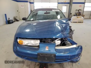 2001 Saturn SL z VIN 1G8ZK52791Z210421, wystawiony jako Copart lot #48808595 z przebiegiem 98 960 mil mil oraz Szkoda całkowita • Salvage title. Historia ofert i sprzedaży dostępna na DreamBid. Obrazek 5.