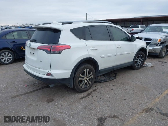 2017 Toyota RAV4 LE with VIN JTMZFREV1HJ103223, listed as a IAAI auction lot 41571466 with 96,860 mi miles and . Bid and sale history available at carsss.com. Image 4.