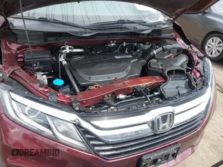 2018 Honda Odyssey EX with VIN 5FNRL6H56JB015557, listed as a IAAI auction lot 42112667 with Not provided miles and . Bid and sale history available at DreamBid. Image 6.