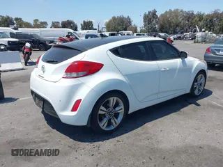 2013 Hyundai Veloster w/Black Int with VIN KMHTC6AD8DU174885, listed as a IAAI auction lot 42408175 with 132,366 mi miles and . Bid and sale history available at DreamBid. Image 4.