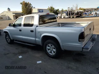 2004 Dodge Dakota Sport with VIN 1D7HL38N44S573883, listed as a Copart auction lot 74955984 with 165,510 mi miles and Salvage Title. Bid and sale history available at carsss.com. Image 2.