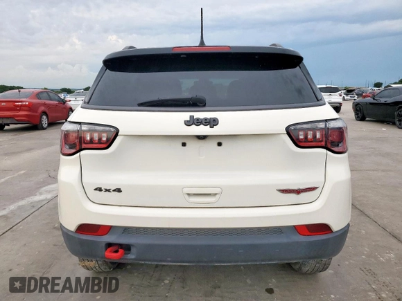 2020 Jeep Compass Trailhawk with VIN 3C4NJDDB3LT189398, listed as a Copart auction lot 59376995 with 75,674 mi miles and Salvage title. Bid and sale history available at DreamBid. Image 6.