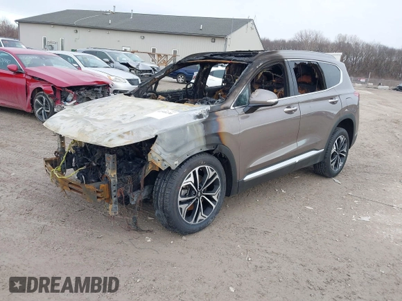 2019 Hyundai Santa Fe Ultimate with VIN 5NMS5CAA6KH035552, listed as a IAAI auction lot 41540230 with Not Provided miles and . Bid and sale history available at DreamBid. Image 2.