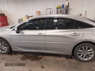 2019 Toyota Avalon XLE z VIN 4T1BZ1FB0KU027896, wystawiony jako IAAI lot #42110371 z przebiegiem 107 104 mil mil oraz . Historia ofert i sprzedaży dostępna na DreamBid. Obrazek 15.