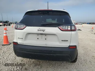 2019 Jeep Cherokee Altitude z VIN 1C4PJMLB7KD402710, wystawiony jako Copart lot #52943215 z przebiegiem 85 836 mil mil oraz Czysty tytuł • Clean title. Historia ofert i sprzedaży dostępna na DreamBid. Obrazek 6.