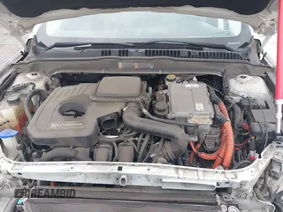 2013 Ford Fusion Titanium Hybrid with VIN 3FA6P0RUXDR386675, listed as a IAAI auction lot 42013986 with 89,349 mi miles. Bid and sale history available at carsss.com. Image 10.