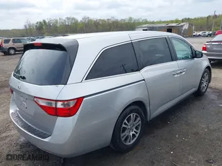2011 Honda Odyssey EX-L with VIN 5FNRL5H69BB031983, listed as a IAAI auction lot 41947443 with 148,111 mi miles. Bid and sale history available at carsss.com. Image 4.