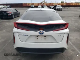 2021 Toyota Prius LE with VIN JTDKAMFP4M3192707, listed as a Copart auction lot 55993185 with 44,909 mi miles and Salvage Title. Bid and sale history available at DreamBid. Image 6.